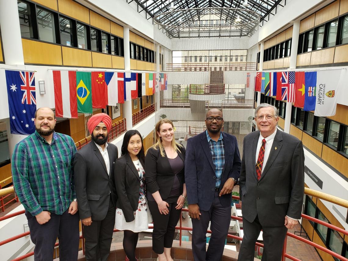 Robert Schulz, right, coached Haskayne EMBA students for Innovation Olympics