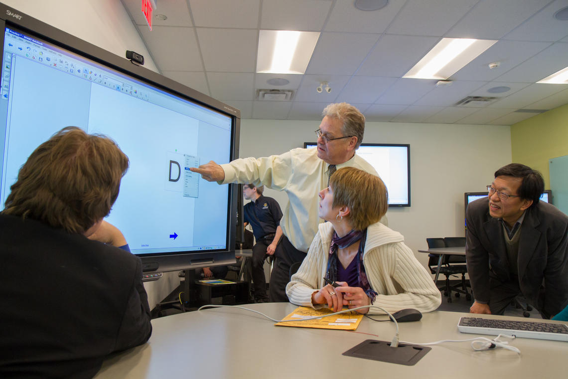 The new active learning classroom in Craigie Hall is outfitted with Smart Boards, collaborative seating and both individual and class-sized sound systems, each designed to take advantage of innovations in both technology and teaching languages and linguistics.