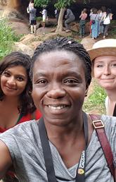 Dr. Rita Yembiliah (fourth from left) flanked by undergrads