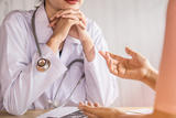 doctor talking to patient